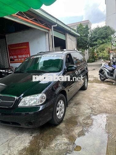 Kia Carnival 2009 GS 2.5 AT - 100000 km