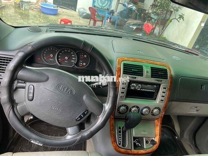 Kia Carnival 2009 GS 2.5 AT - 100000 km