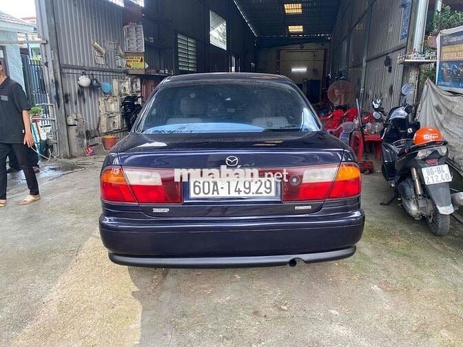 cần bán xe mada 323 số sàn xe gia đình máy 1.6