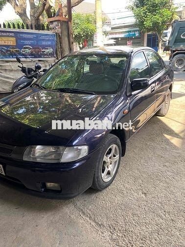 cần bán xe mada 323 số sàn xe gia đình máy 1.6