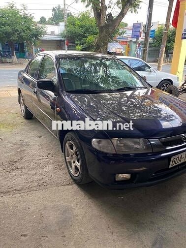 cần bán xe mada 323 số sàn xe gia đình máy 1.6