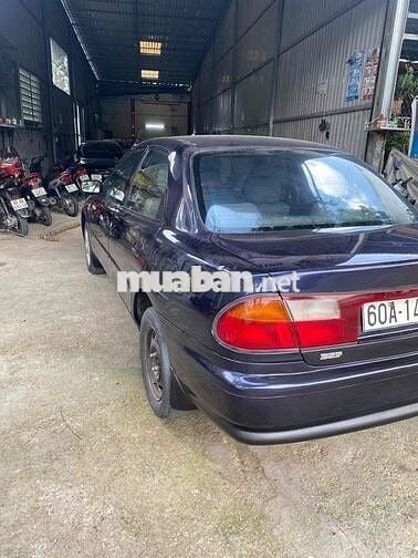 cần bán xe mada 323 số sàn xe gia đình máy 1.6