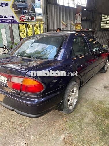 cần bán xe mada 323 số sàn xe gia đình máy 1.6