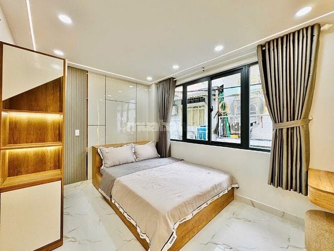 Nhà 2 Lầu đẹp Cao cấp hẻm 1 trục cách Mặt tiền Duy Tân 30m, P15, Q.PN