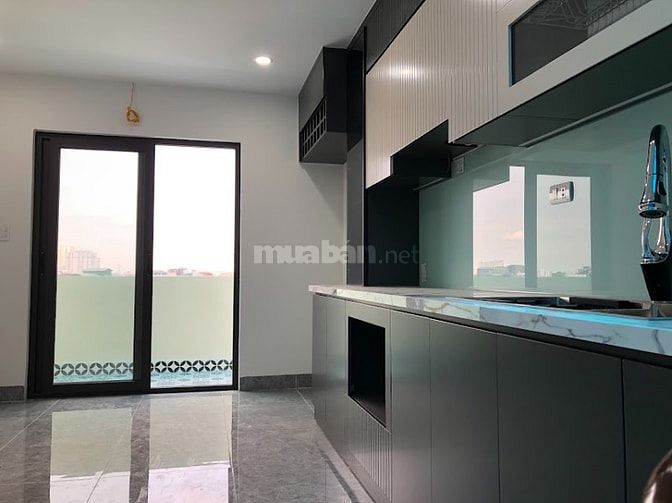Nhà riêng 40m x 7T có thang máy oto vào nhà,giá 13,5 tỷ, ngõ110 Nam Dư