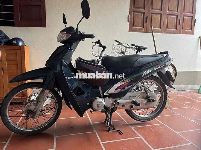 nha co chiec xe khong dung den can ban