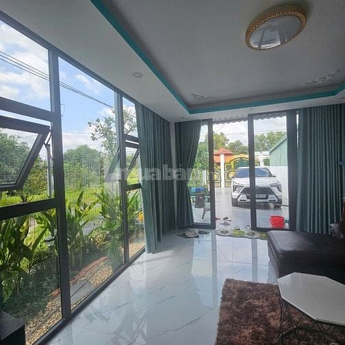Cần bán nhà mặt tiền đường DH14, căn góc chợ Long Thượng, Phước Lý