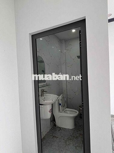 Nhà mới xây ở ngã tư Xoài Đôi, DT 100m2 , có sân để ô tô, giá 1ty240