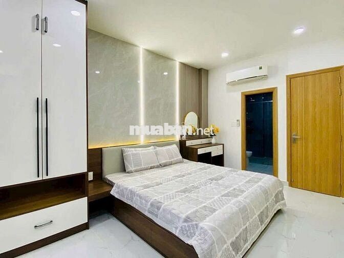 Nhà Gò Vấp hẻm xe hơi cách mặt tiền 10m 3 tầng 3 phòng Đường số 8 P11