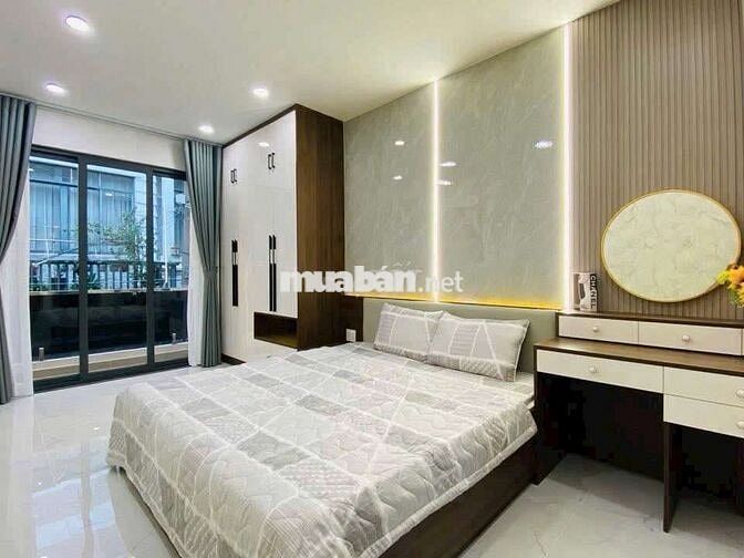 Nhà Gò Vấp hẻm xe hơi cách mặt tiền 10m 3 tầng 3 phòng Đường số 8 P11
