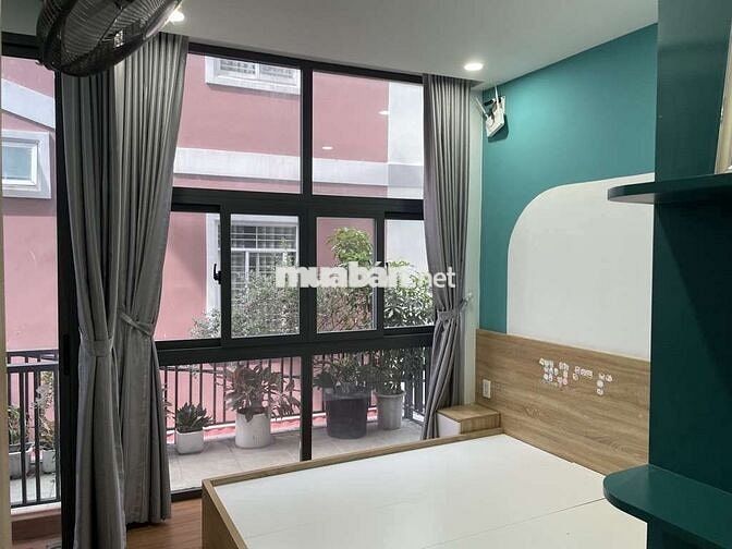 Bán Gấp nhà đẹp 4tang cạnh Trương Quốc Dung 110m2 cách MT 20m nhỉn 6ti