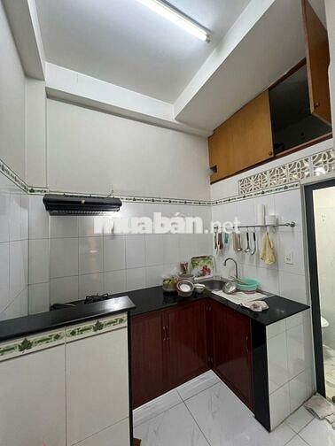 4 Tầng  Nhà Quận 1 - đối diện sân vận động hoa lưu