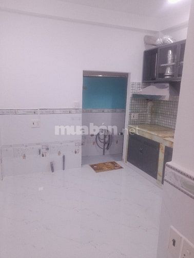 Nhà 1 tr+ 2 lầu+  gác lửng+  sân thượng 4 pn ,4 wc hẻm thoáng rông đẹp