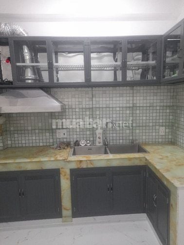 Nhà 1 tr+ 2 lầu+  gác lửng+  sân thượng 4 pn ,4 wc hẻm thoáng rông đẹp