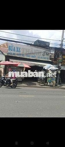 Nhà gốc 2 mặt tiền quốc lộ 50 DT 6.5 x 35m 1 lầu