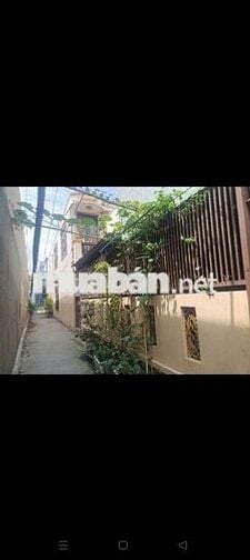Nhà gốc 2 mặt tiền quốc lộ 50 DT 6.5 x 35m 1 lầu