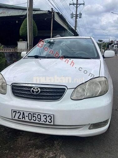 Toyota Corolla Altis 1.8G MT 2004 trắng đẹp