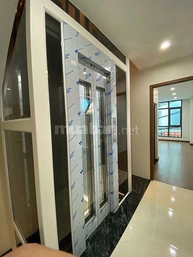 BÁN TÒA NHÀ 9 TẦNG PHỐ NGHĨA TÂN – THANG MÁY – HẦM Ô TÔ – KINH DOANH 