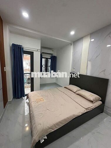 Nhà mới hẻm ô tô, gần ngân hàng ACB Phan Huy Ích.