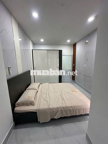 Nhà mới hẻm ô tô, gần ngân hàng ACB Phan Huy Ích.