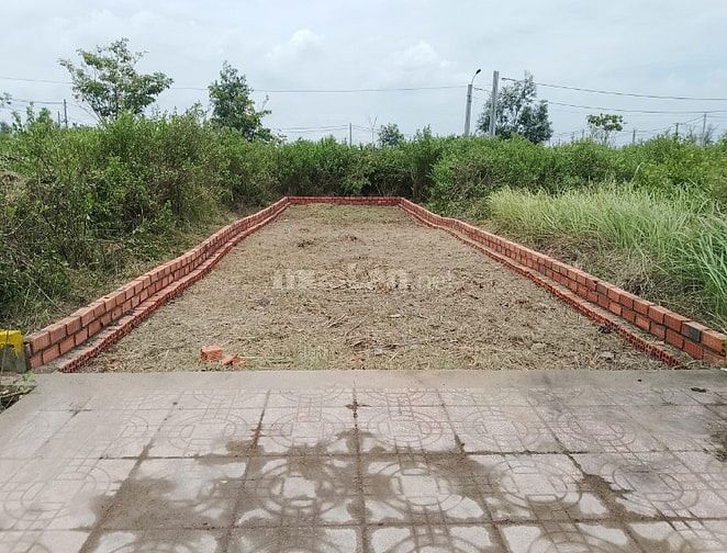 Đất nền KDC Tân Lân Residence mặt tiền QL50, 700tr / nền