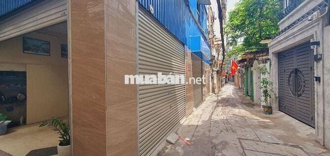 Bán Nhà Lô Góc Oto Hào Nam ,Đống Đa 16,5Ty 62m2 mặt Tiền 16m