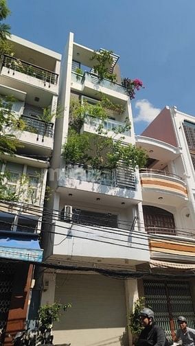 nhà 4 tầng 4x17m Mặt tiền Nguyễn Hồng Đào - 16 tỷ