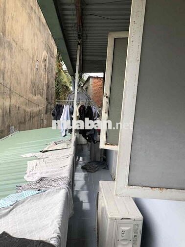 nhà liên kề một trệt một lầu ngã tư Bình triệu