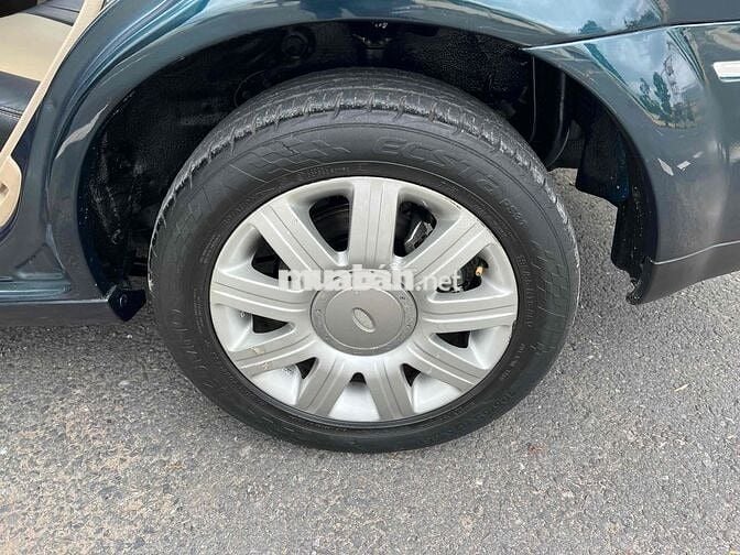 Ford Laser 2004 GHIA 1.8 AT - 100000 km