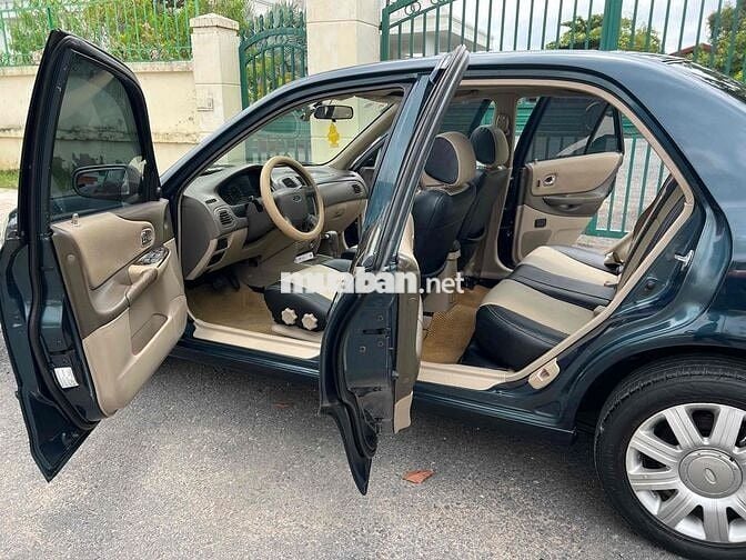 Ford Laser 2004 GHIA 1.8 AT - 100000 km