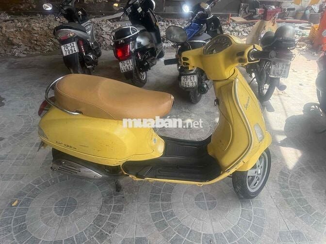 xe piggio Vespa Lx  Y xang phun Fi dời 2012