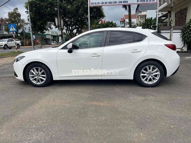 Mazda 3 2015 1.5 AT Hatchback - 100 km