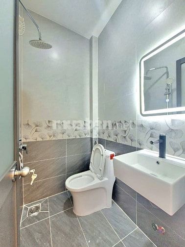 BÁN NHÀ TO ĐÙNG - XÂY MỚI 100% - GẦN LỘ HUỲNH TẤN PHÁT