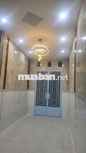 Bán nhà đường Quốc Lộ 50 DT.2m5×9m5 } 1 Lầu 1 Lững 3 Phòng 1 toilet.