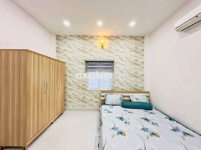 NHÀ 4LẦU NGUYỄN THỊ ĐẶNG QUẬN 12