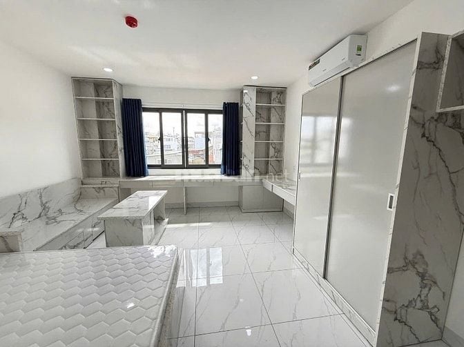 Bán tòa nhà 6 Lầu, căn hộ dịch vụ góc 3 mặt hẻm 6m Chu Văn An, P12