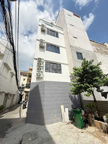 Bán tòa nhà 6 Lầu, căn hộ dịch vụ góc 3 mặt hẻm 6m Chu Văn An, P12