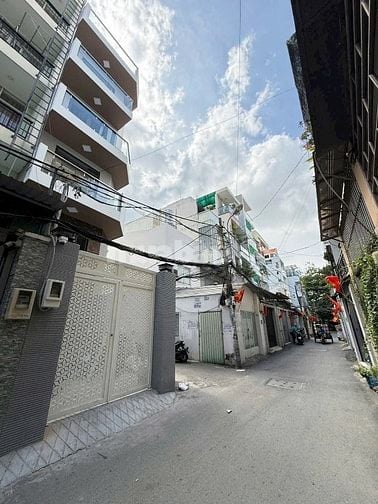 Bán tòa nhà 6 Lầu, căn hộ dịch vụ góc 3 mặt hẻm 6m Chu Văn An, P12