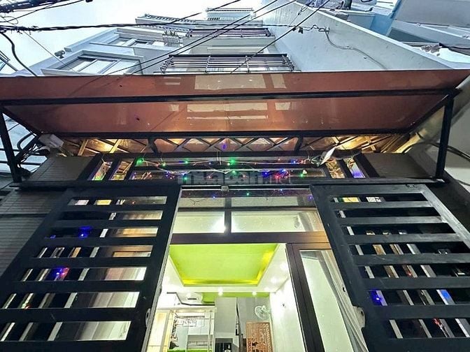 BÁN NHÀ 5 TẦNG- 4PN- PHƯỜNG 7- CẠNH PHAN XÍCH LONG