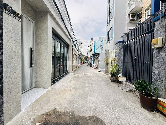 NHÀ 3 Lầu DT:6,2x22m, DT: THU NHẬP 80 triệu/tháng, xe hơi Lê Văn Thọ