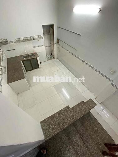 Cho thuê nhà trệt + lầu 2PN đường xe hơi gần chợ