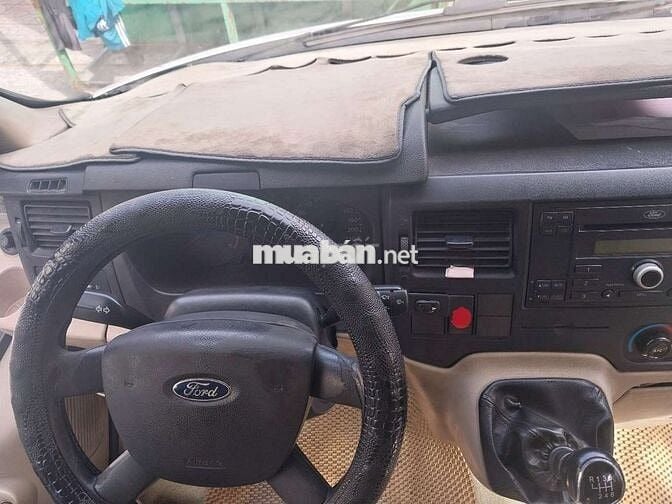 Ford Transit 2015 Van 6 ghế 900kg chạy giờ cấm