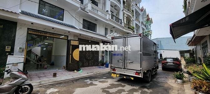 BÁN NHÀ PHỐ 3,5 TẤM (4PN, 5WC , 1 GARAGE Ô TÔ, ĐƯỜNG RỘNG 11M)