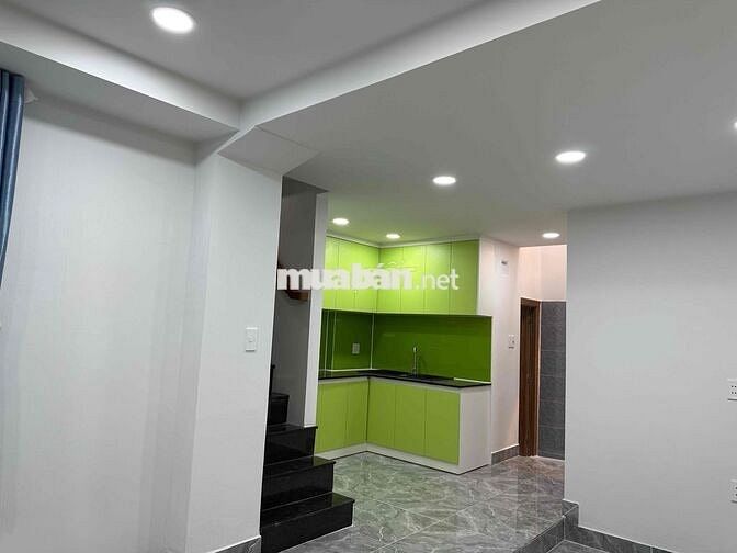 nhà riêng lẻ gần chợ Thị Nghè trệt lầu kiên cố , 2 mặt thoáng mát