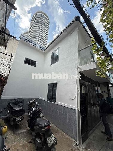 nhà riêng lẻ gần chợ Thị Nghè trệt lầu kiên cố , 2 mặt thoáng mát