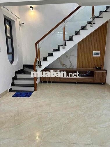 Nhà 1 trệt 2 lầu mặt tiền nhựa dx 59 gần chợ,(đã hoàn công)
