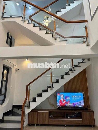 Nhà 1 trệt 2 lầu mặt tiền nhựa dx 59 gần chợ,(đã hoàn công)
