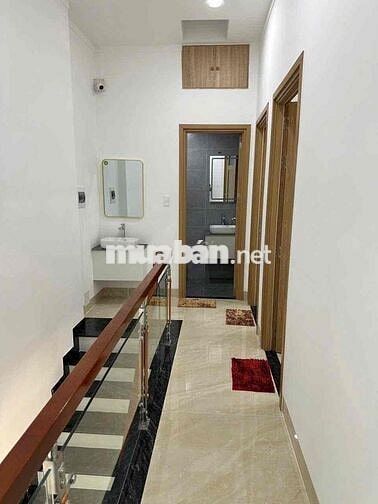 Nhà 1 trệt 2 lầu mặt tiền nhựa dx 59 gần chợ,(đã hoàn công)
