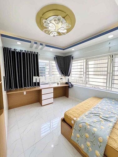 Nhà đẹp Cách Lạc Long Quân 100m2, Tân Bình TPHCM 5 tầng, 3PN, 4WC giá