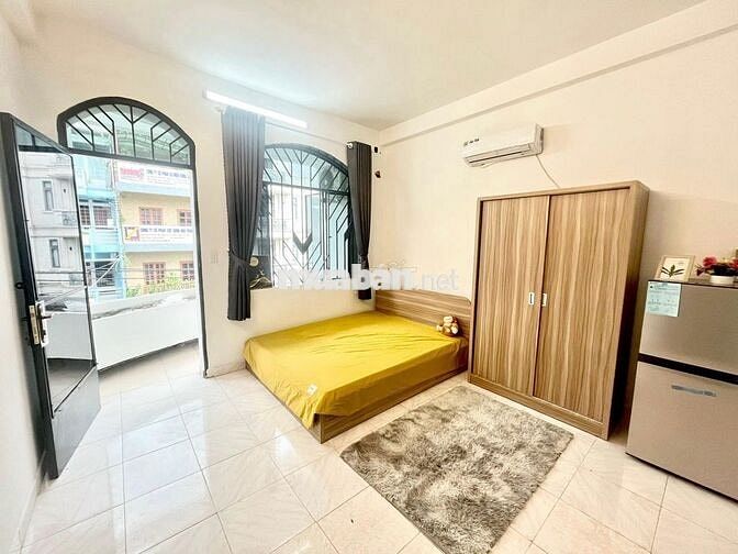 Phòng trọ giá rẻ ngay chợ Bà Chiểu full nội thất ban công rộng